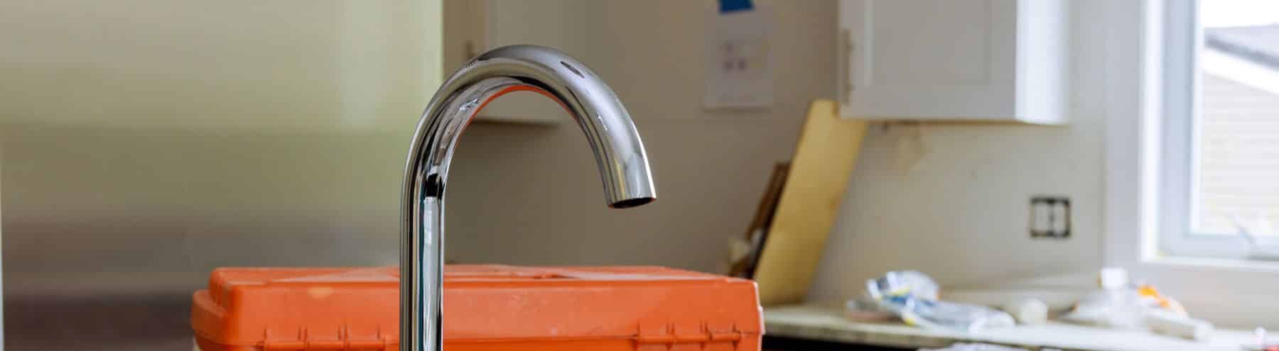newly installed kitchen faucet without a head