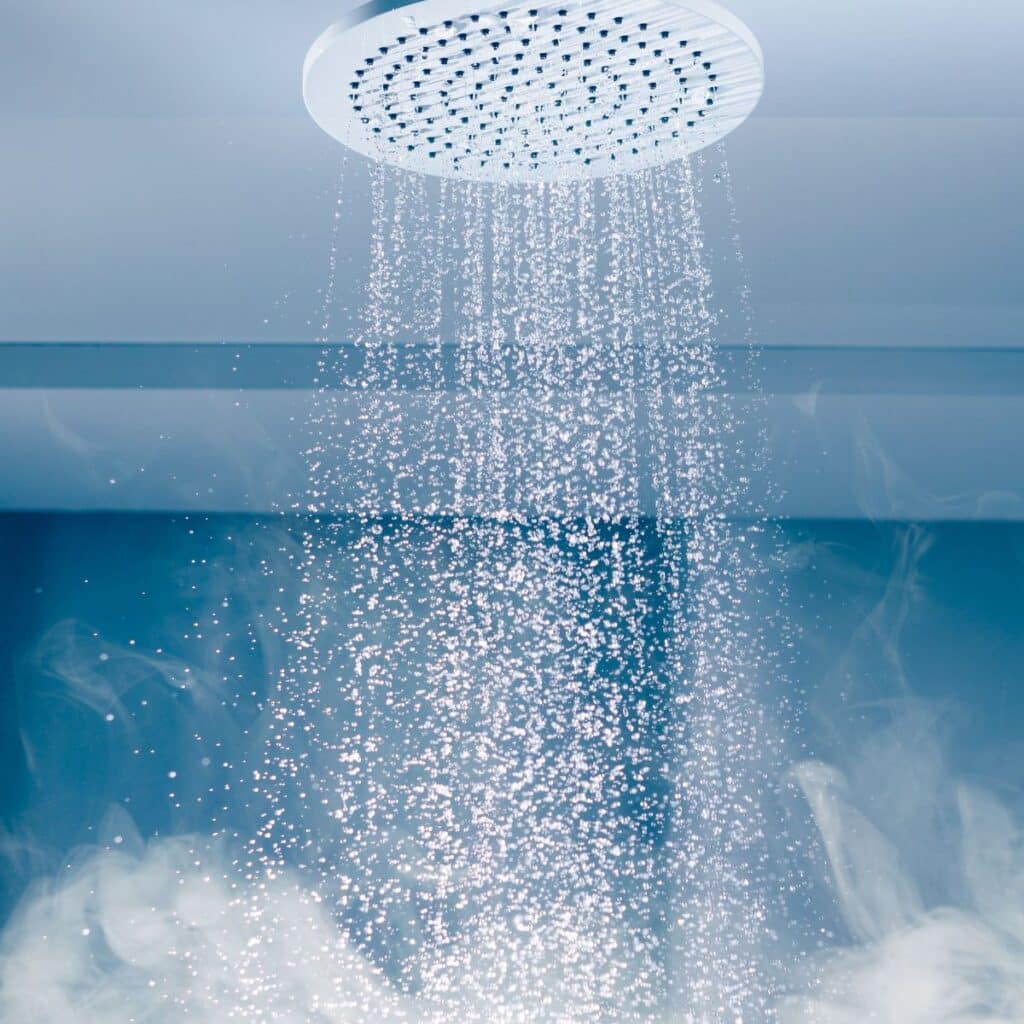 steaming water coming from a shower head